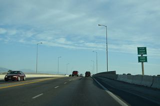 Business Loop I-84/SH 27 span the Snake River south into Cassia County.