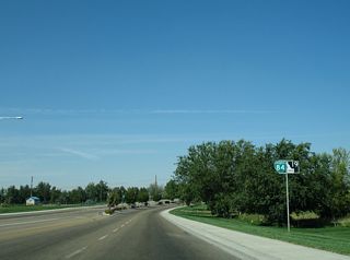 Business Loop I-84 west after Chicago Street. Although signage for SH 19 was dropped along Centennial way between Simplot Boulevard and I-84 after 2006, ITD GIS Data still inventories the arterial as part of the state highway.