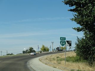 Centennial Way comprises a four lane parkway north across Indian Creek and a Union Pacific Railroad line to Interstate 84 by the Boise River. A replacement of this sign assembly made by 2011 excluded SH 19.