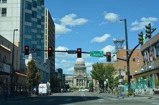 Capitol Boulevard heads north from Main Street and Boise City Hall to the Idaho State Capitol.