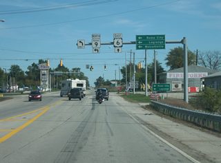 Now at the spot where SR 9 will break off toward the north through the towns of Rome City and Wolcottville en route to LaGrange. The LaGrange County seat lies 14 miles to the north of U.S. 6.
