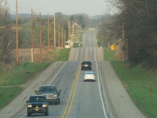 U.S. 20 heads straight after its trip around the northern tip of Otter Lake. Steuben County is well-known for its small lakes scattered throughout.