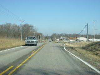 Arthur Curry Road heads west from SR 101 to the Hanna Creek Ramp.