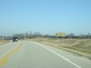SR 101 passes by the intersection with Pea Ridge Road, which heads west to the Garr Hill Ramp off of Brookville Lake.