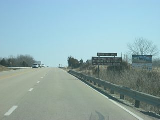 Recreational interests to the southern part of Brookville Lake, such as the Bonwell Ramp, Edward Lewis Overlook and the Corps-Visitor Center are directed to an unnamed road that leads north to those attractions near the lake. Following the intersection, the highway loses the climbing lane.