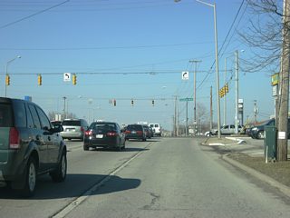At the intersection with Coldwater Road and SR 930 (Coliseum Boulevard). SR 930 constitutes a 13 mile highway that used to carry U.S. 30 for a bypass around the north side of Fort Wayne. SR 930 (Coliseum Boulevard) is primarily a four to six lane highway that has since seen commercial development, especially at its intersection with Coldwater Road, which is among the busiest in Fort Wayne.