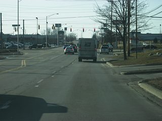 Illinois Street westbound begins at Jefferson Boulevard and heads due west toward its first intersection with Hillegas Road. The eastbound lanes serve a gas station to the east at the intersection with Jefferson Boulevard and Illinois Road. Hillegas Road, and its southern counterpart Ardmore Avenue, is a major north-south arterial that begins at California Road and heads south to Airport Expressway.