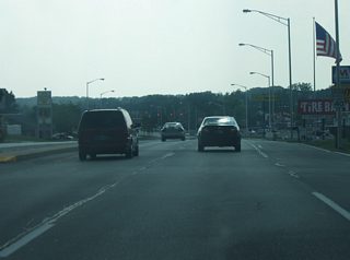 Views of Jefferson Boulevard to the west of Apple Glen Boulevard as they near the intersection with Covington Road in the second picture. The highway remains four lanes to the southwest as it follows the original routing of U.S. 24.