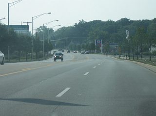 A view of Jefferson Boulevard as it heads to the northwest toward the junction with Main Street, which goes back to the east into Downtown Fort Wayne. Originally, Main Street carried U.S. 24 and SR 14 before Jefferson Boulevard was extended this way.