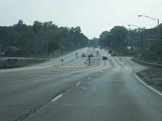 West of the intersection with Hillegas Road/Ardmore Avenue, Jefferson Boulevard passes near the Jefferson Pointe shopping center, an open air lifestyle center. Up ahead is the intersection with Apple Glen Boulevard, which forms the western boundary of Jefferson Pointe.