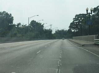 Now crossing over the St. Mary's River back with the eastbound lanes of old U.S. 24 and SR 14, the road takes on the name of Jefferson Boulevard.