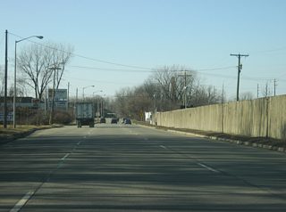 A Lincoln Highway shield honors the original routing of the Lincoln Highway along Washington Boulevard through the city of Fort Wayne. The Lincoln Highway in Indiana generally follows the routing of U.S. 30 and U.S. 33.