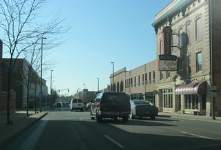 West of Calhoun Street, Washington Boulevard passes by the Grand Wayne Convention Center as it approaches the intersection with Harrison Street. Harrison Street used to run to the south of Washington Boulevard before it was cut off by the convention center.