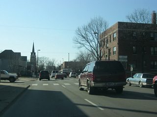 Washington Boulevard nears the intersection with Broadway Street, which at one time carried the routes of SR 1 and SR 3 to the southwest.
