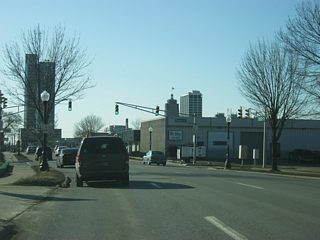 West of Anthony Boulevard, Washington Boulevard follows the old routing of U.S. 24, U.S. 30 and SR 14 west toward Downtown Fort Wayne. The road typically consists of three westbound lanes at it passes by the campus of Indiana Tech in the first picture, the intersection with Harmar Street in the second picture and Hanna Street in the fourth picture.
