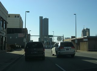 Washington Boulevard nears the intersection with Lafayette Street (U.S. 27 north). The sign bridge used to hold the route markers of the various U.S. and state highways that were routed through Fort Wayne. Interestingly, U.S. 27 isn't signed here, although it still follows Lafayette Street north toward its northern terminus at Interstate 69.