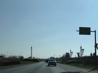 Crawfordsville Road (former U.S. 136) through Speedway doubles as Hulman Memorial Way.