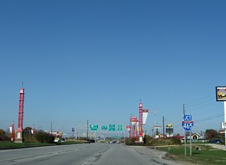 Junction Interstate 465 shield assembly posted ahead of the Crawfordsville Road interchange with the Indianapolis Beltway. Accelerate465 realigned Crawfordsville Road to smooth transition into the road west to U.S. 136 at new-Exit 16A of I-465.