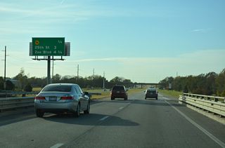 Construction completed in Fall 2021 rebuilt the folded diamond interchange (Exit 15) with N Broadway Avenue and replaced the bridges taking I-235/K-96 over the Arkansas River.