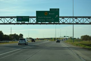 K-96 branches west from Interstate 235 south at a directional T interchange (Exit 13).