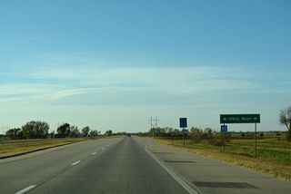 K-96 transitions into an at-grade expressway at N 119th Street W on the northwest side of Maize.