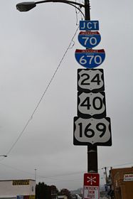 Central Avenue connects with I-70/U.S. 24-40-169 at a parclo interchange (Exit 422D) preceding a flyover linking to Interstate 670 east.