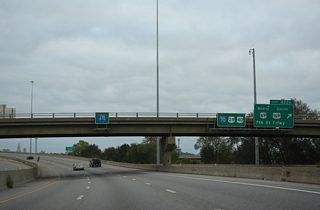 I-70 and I-670 proceed east through a parclo interchange taking U.S. 69 north toward Downtown Kansas City and bringing U.S. 169 east onto Interstate 70.