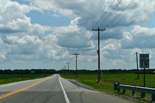 Leading away from the intersection with U.S. 301 on MD 19 (Roberts Station Road) eastbound.