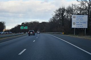 The Metro Orange Line parallels U.S. 50 east to New Carrollton Station north of Exit 5. Landover Station lies off Pennsy Drive northeast from MD 202 (Landover Road).