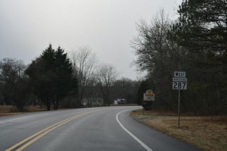 The lone reassurance marker for MD 287 west stands just beyond the Delaware state line.