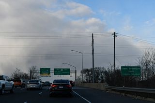 MD 201 (Kenilworth Avenue Freeway) north spans Beaverdam Creek and the AMTRAK Northeast Corridor leading into the directional cloverleaf interchange with U.S. 50 (John Hanson Highway).