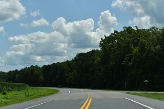 A former alignment of MD 313, Hollingsworth Circle loops 0.54 miles south from MD 313 (Goldsboro Road) to Schuyler Road at Hollingsworth Crossroads.