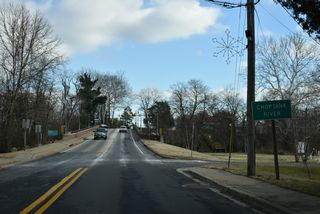 MD 314 (Sunset Avenue) crosses the Choptank River north of the Greensboro Boat Ramp. The bridge built in 1995 across the river is dedicated to John V. Riffle.