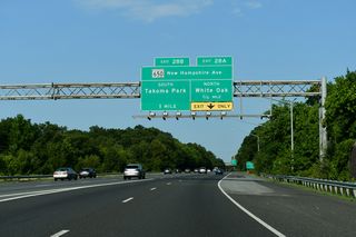 Traffic from I-95 south joins Interstate 495 west ahead of Exit 28 to MD 650 (New Hampshire Avenue). MD 650 is an arterial route joining Takoma Park with White Oak, Colesville and Cloverly.