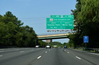 A directional cloverleaf interchange links I-495 with MD 650 (New Hampshire Avenue) at Exit 28. New Hampshire Avenue extends north from Washington, D.C. through Takoma Park to Langley Park and the Capital Beltway at Hillandale.