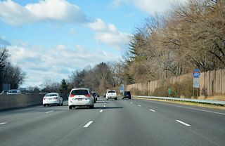 Interstate 495 curves between Argyle Park and Sligo Creek Golf Course by this westbound shield assembly that was removed by 2019.