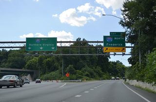 I-495 continues west toward the merge with I-270 Spur while Interstate 270 branches 33 miles northwest to I-70 and U.S. 40 in Frederick. I-270 historically was designated as Interstate 70S between the Capital Beltway and Frederick.
