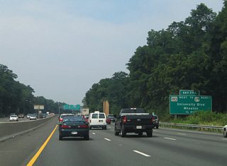 Older guide signs, from when Exit 29 included two ramps to MD 193, referenced the U.S. 29 connection for Exit 29A. U.S. 29 and University Boulevard cross paths at Four Corners just north of the beltway.