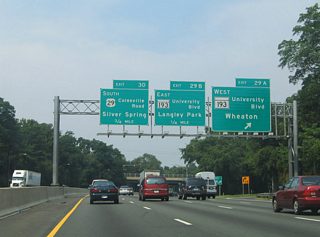 Interstate 495 westbound at the Exit 29 (former Exit 29A) ramp departure onto MD 193 (University Boulevard). MD 193 continues beyond Four Corners to Wheaton and MD 97 before arcing back southward to Kensington.