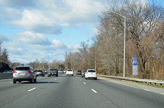 Interstate 495 travels by Montgomery Blair High School and this assembly including the Capital Beltway trailblazer.