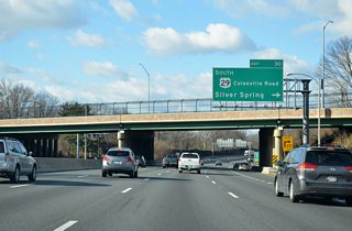 Colesville Road crosses over the Capital Beltway ahead of Exit 30 to U.S. 29 south. U.S. 29 enters Silver Spring nearby, meeting MD 97 and 410 before entering the capital city. Georgia Avenue carries the route south to Petworth and Howard University in D.C.