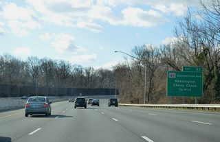 One half mile east of Exit 33 to MD 185 (Connecticut Avenue). MD 185 travels between the District of Columbia and MD 97 at Aspen Hill along all of Connecticut Avenue.