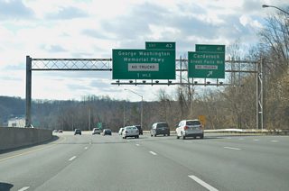 Exit 41 carries drivers onto Clara Barton Parkway westbound at the MacArthur Boulevard under crossing. The parkway concludes at the merge with MacArthur Boulevard; MacArthur Boulevard continues 3.4 miles west to Cropley, Truxton, and Great Falls alongside the C & O Canal National Historic Park.
