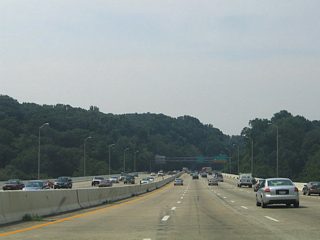 A nondescript eight lane bridge spans the Potomac River between the Bethesda and McLean areas. Named the American Legion Bridge, it opened in December 1962.2