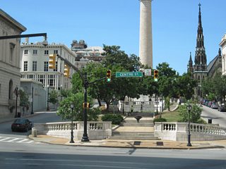 Charles Street partitions into Washington Place around Washington Monument between Centre and Madison Streets.