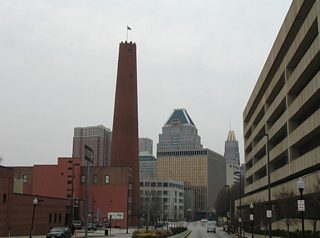 Approaching the Shot Tower on Fayette Street west by the Baltimore main post office. The Shot Tower, a National Historic Landmark, was used to create lead shot from 1828 to 1892.
