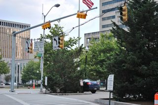 Lexington Street east at Holliday Street north and Baltimore City Hall during a traffic light replacement project.