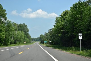 U.S. 2 advances southeast through Ottawa National Forest from the split with M-64 near Marenisco.