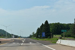 Originally a trumpet interchange, the exchange between U.S. 2 and U.S. 51 was converted to a roundabout.