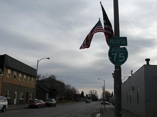 A reassurance marker lines East Portage Avenue after the Business Spur I-75 eastern turn from Ashmun Street north in Downtown Sault Ste. Marie.